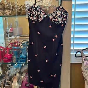 Geometrie brand black lined dress. Zipper in back , Embroidered flowers . Size 6